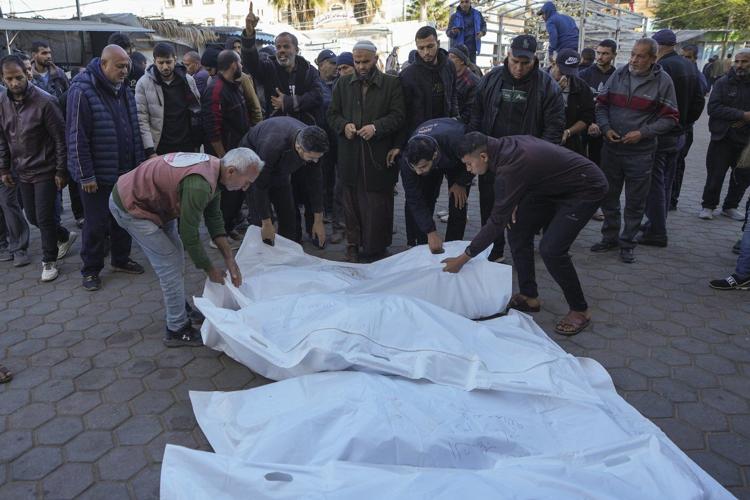 A rocket from Yemen strikes Tel Aviv, injuring 16, and Palestinians mourn a dozen children in Gaza