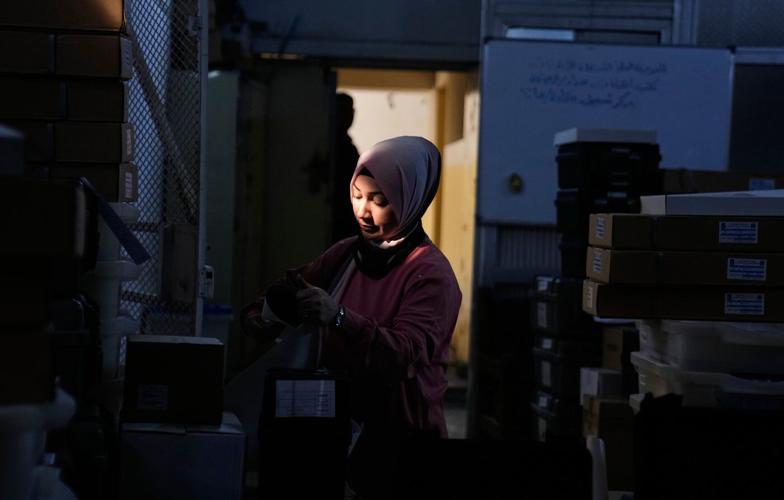 Photos show Iraqi security forces and displaced people voting early in parliamentary election