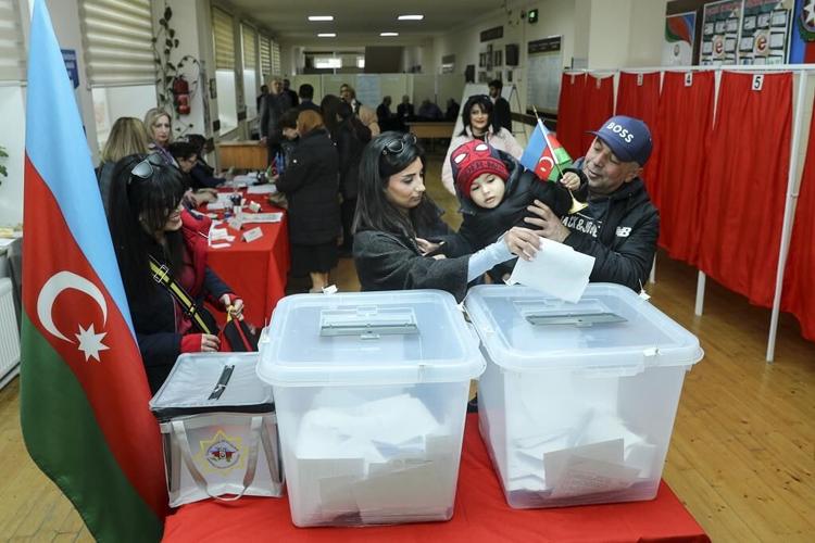 Azerbaijan's president set to win reelection in a snap vote, riding on a victory in Karabakh