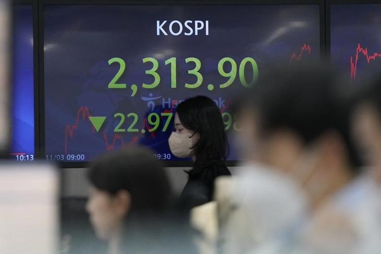 Asia stocks fall after Fed says more US rate hikes likely