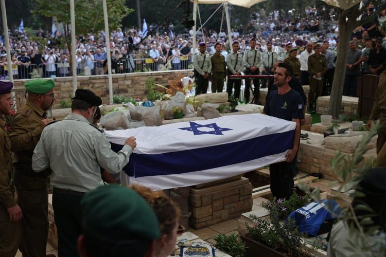 Tens of thousands attend funeral of Israeli soldier whose remains were held in Gaza for 11 years