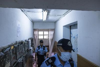 Hong Kong police arrest woman accused of killing 3 young daughters