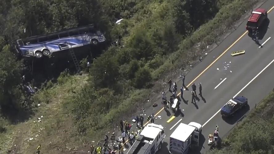 Bus carrying high school students to band camp crashes, killing 2 and seriously injuring others