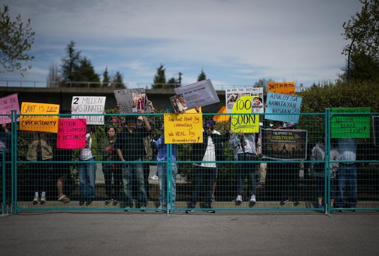 Protesters outside Vancouver's Lapu Lapu festival marking 1 year after 11 were killed