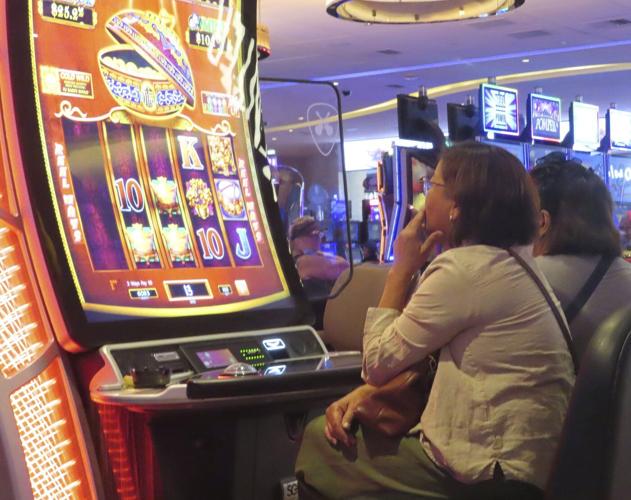Rival union official says Atlantic City casino union boss should resign for opposing a smoking ban