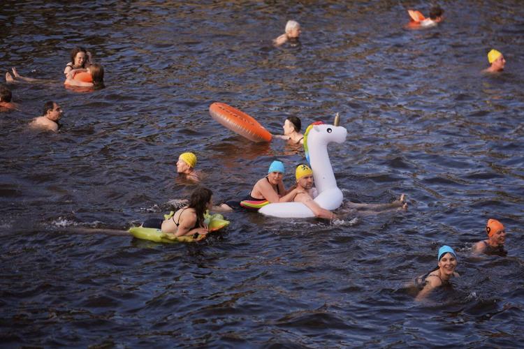 Berliners jump into the Spree River to show its clean enough for swimming