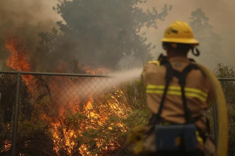 Firefighters hope cooler weather will aid their battle against 3 major Southern California fires