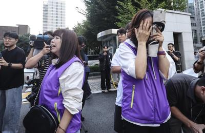 South Korean court gives prison sentences to 3 police officers over deadly 2022 Halloween crush