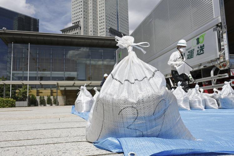 Slightly radioactive Fukushima soil is used at Japanese prime minister's office to prove safety