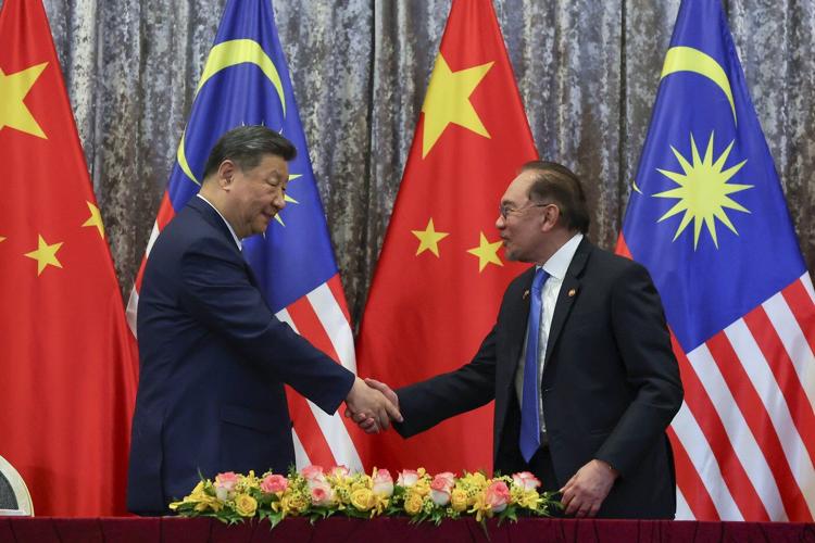 Xi says China will stand with Southeast Asian countries in face of economic shocks