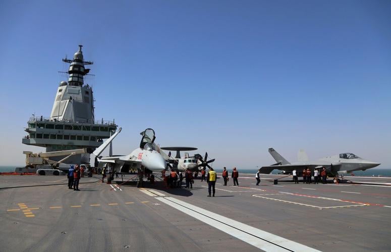 China commissions new aircraft carrier as it seeks to extend power far from its coast