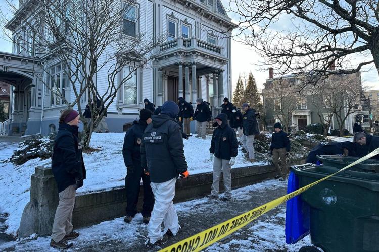 Search for the Brown University shooter resumes as questions swirl about campus security