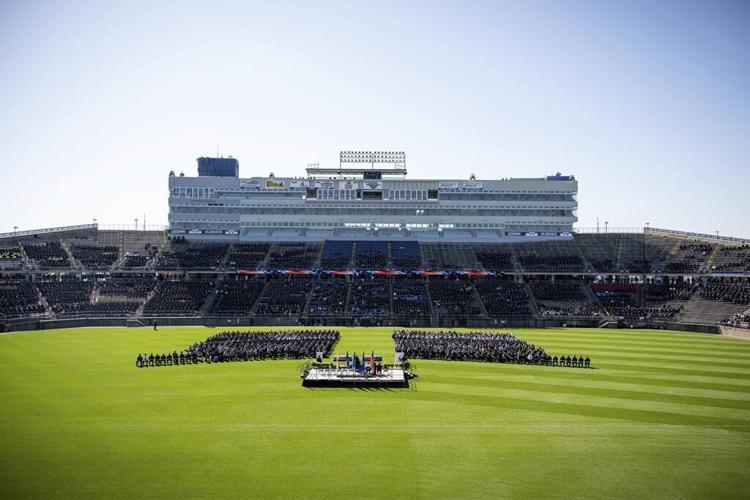 Funeral for 2 ambushed officers draws peers from around US