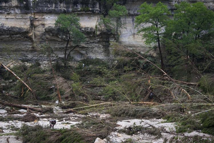 Texas floods leave at least 51 dead, 27 girls missing as rescuers search devastated landscape