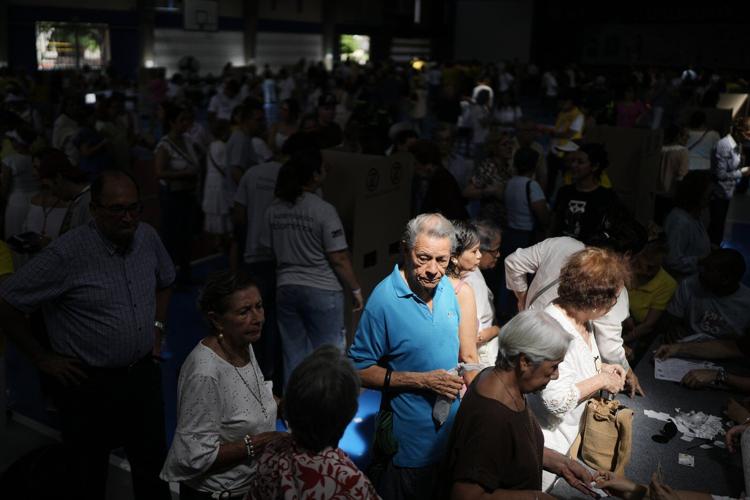 Colombians vote in a presidential runoff that pits an outsider against a progressive