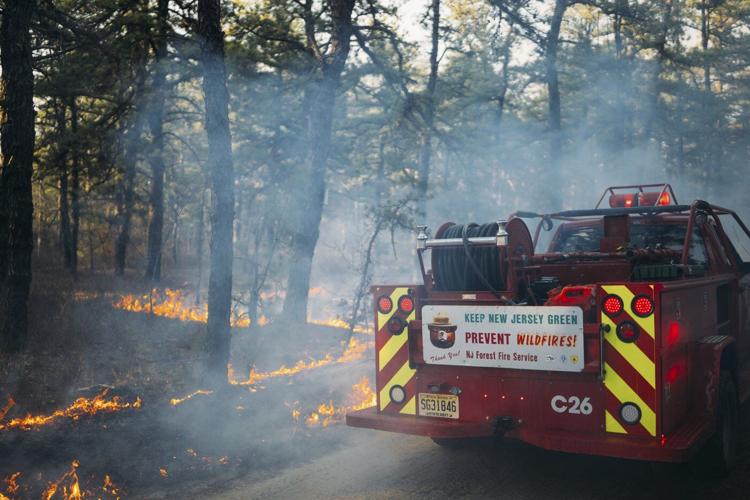 Firefighters in the Carolinas battle multiple wildfires as New Jersey crews contain a forest blaze