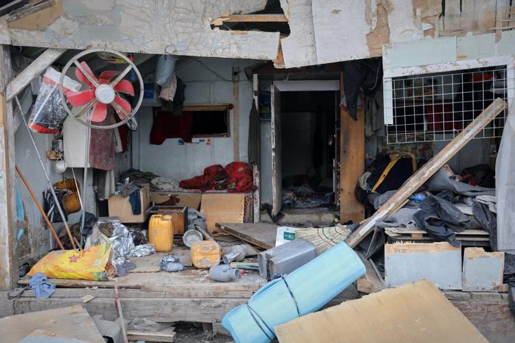 Rescue crews race through rubble after a deadly Kabul airstrike, in photos