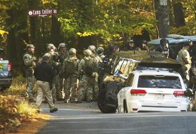A murder warrant is issued for a Massachusetts man wanted in the shooting death of his wife