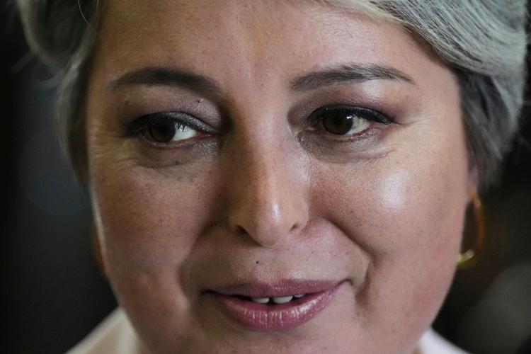 Photos show voters taking to the polls for Chile's general elections