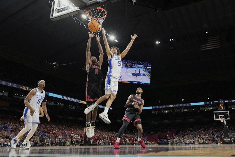 Houston rallies to beat Duke 70-67 in the Final Four and advance to face Florida for the NCAA title