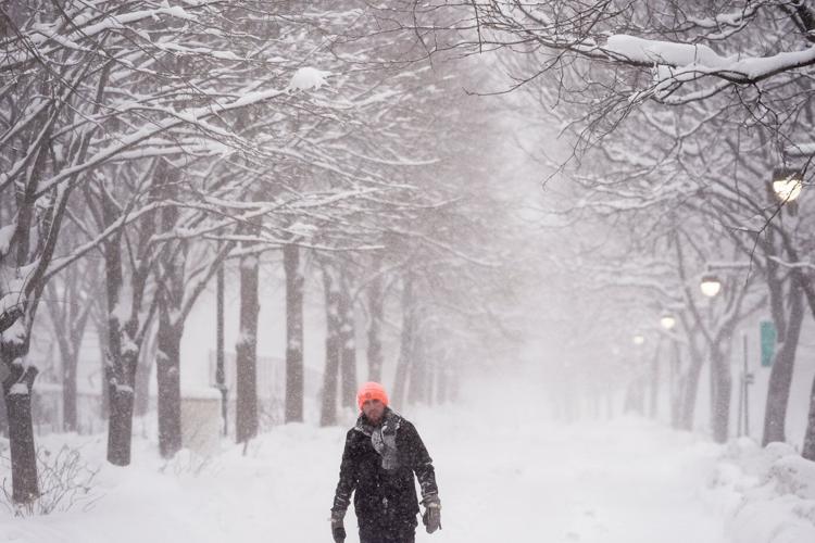 Northeast US digs out from brutal storm that disrupted flights and canceled school