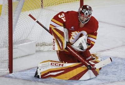 Flames sign goalie Dustin Wolf to seven-year, US$52.5-million contract extension