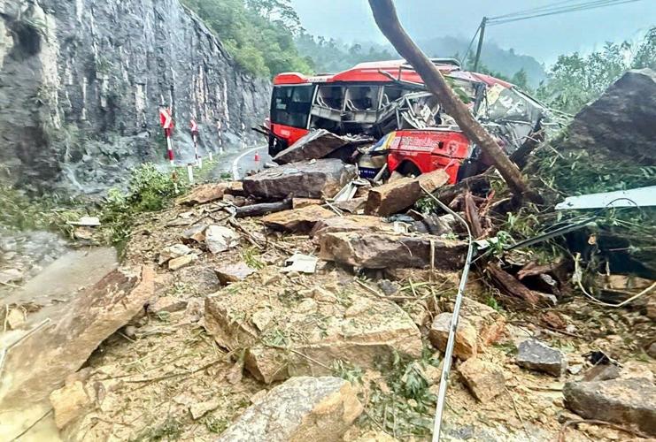 Landslide strikes bus on mountain pass in Vietnam, killing 6, as heavy rain persists