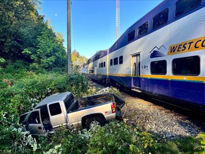 Man thrown from vehicle in crash involving commuter train in Metro Vancouver