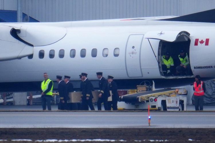 Bodies of pilots who died in collision at N.Y. airport are repatriated to Canada