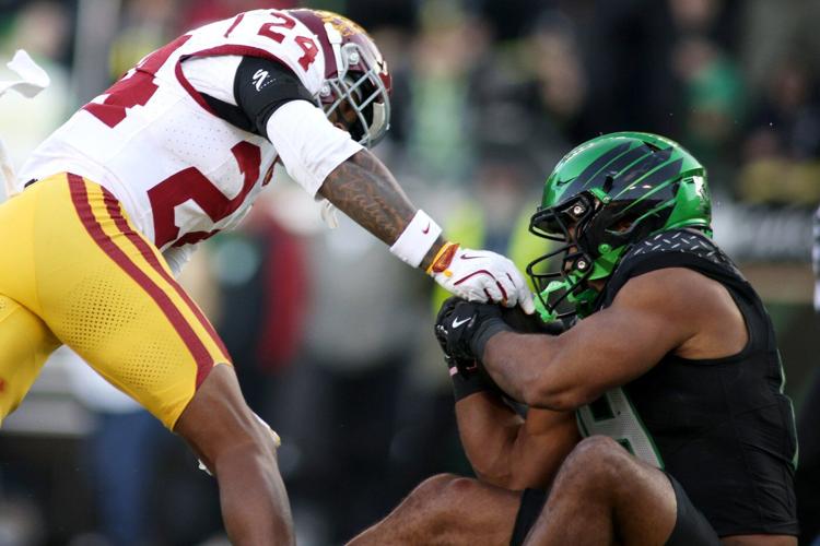 The Latest: Oregon jumps back into the top 5 of the AP Top 25 college football rankings