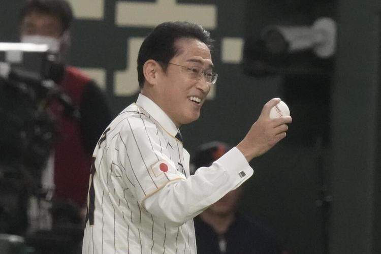 Kishida makes 1st pitch in Japan game with South Korea