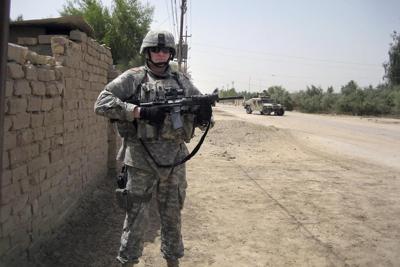 Takeaways from the AP's review of Tim Walz's descriptions of his military record