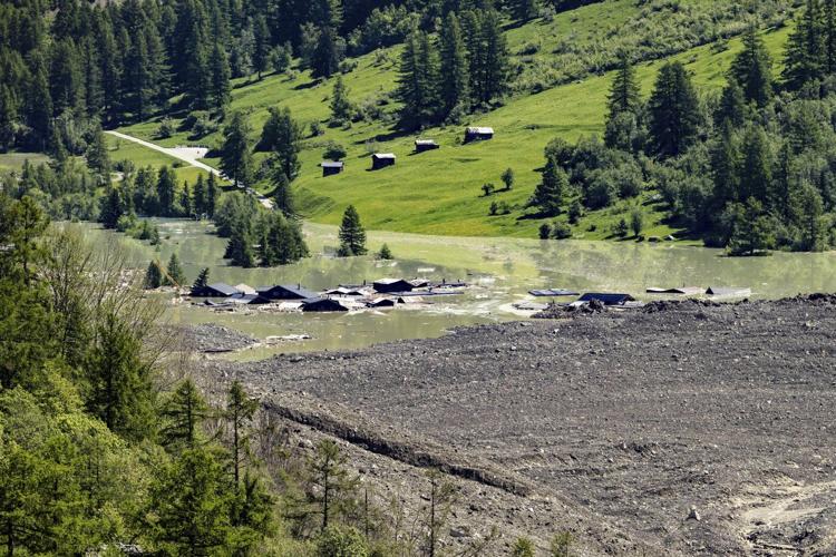 Swiss president pledges aid for Alpine villagers left homeless after glacier collapse