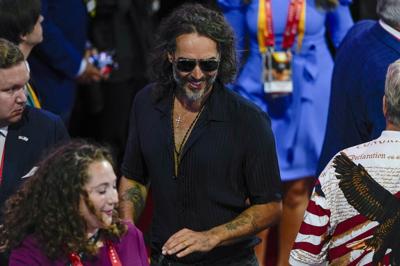 UK police charge comedian Russell Brand with rape and sexual assault