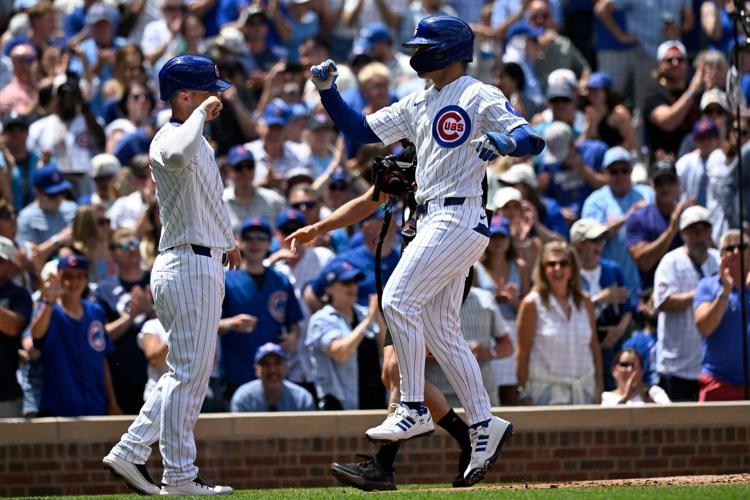 Okamoto hits a 3-run homer as the Blue Jays rally past the Cubs 8-6