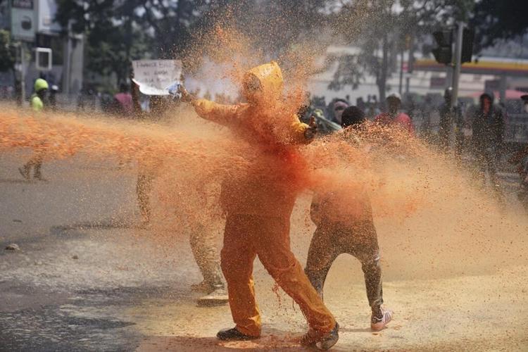 Kenyan police fire blanks to disperse protesters hours after parliament breached