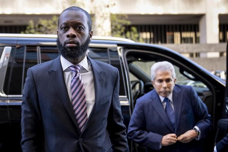 Fugees rapper in political conspiracy trial launches defense