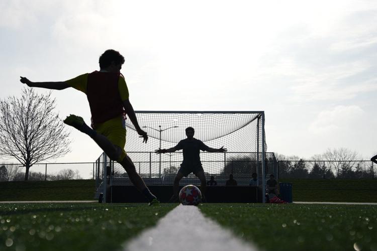 Iranian American soccer fans are torn between pride and protest as the World Cup nears