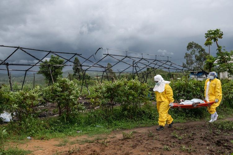 Residents burn an Ebola treatment center in Congo as anger grows over the outbreak