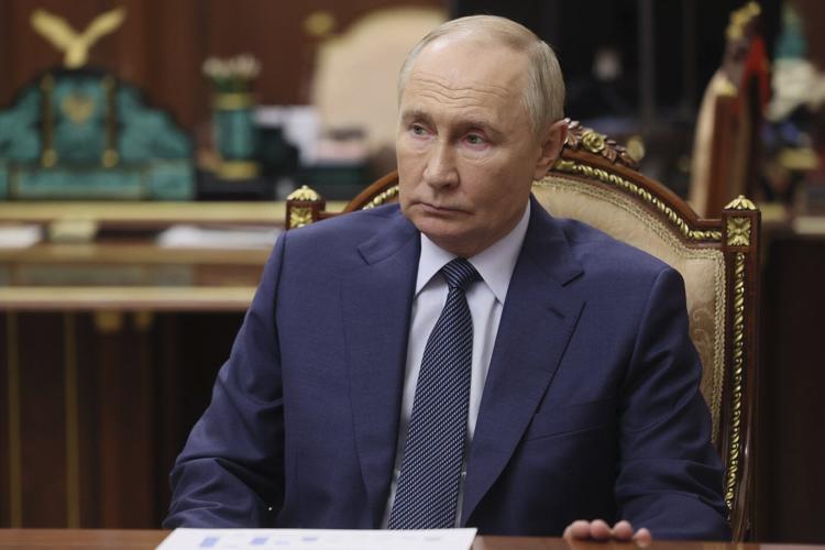Russia says Iran's president will visit this week and sign a partnership pact with Putin