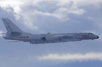 China sends large group of warplanes, navy ships towards Taiwan in forceful display