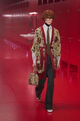 Valentino's Michele upends high fashion by setting Paris show inside staged public toilets