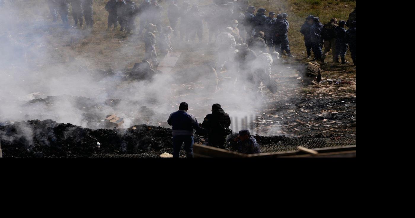 Death toll rises to 22 after cargo plane carrying money crashes near Bolivia's capital