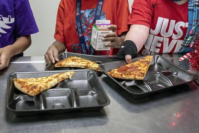 There's a new push to put whole milk back in school meals. Here's what you should know