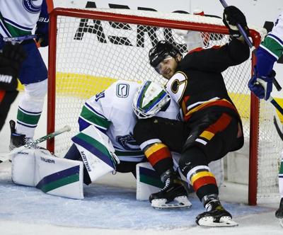 Kuzmenko, Martin lead Canucks to 4-3 shootout win over Flames