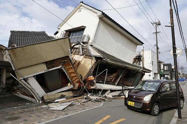 Rescuers search for the missing after Japan earthquake as death toll rises to 13
