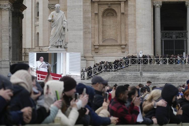 Pope Francis baptizes 21 babies in an annual ceremony at the Sistine Chapel