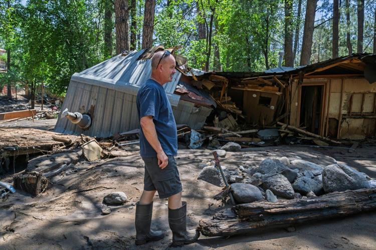 Flash flooding that killed 3 leaves New Mexico village heartbroken, anxious as cleanup begins