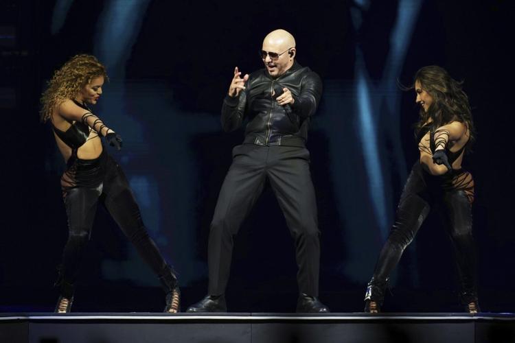 Pitbull is a fan of his fans. He says it's his job to make them feel good