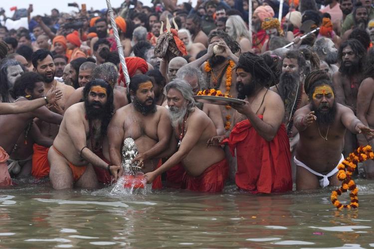 Millions of pilgrims and naked, ash-smeared ascetics take holy dips in India's mega Hindu festival